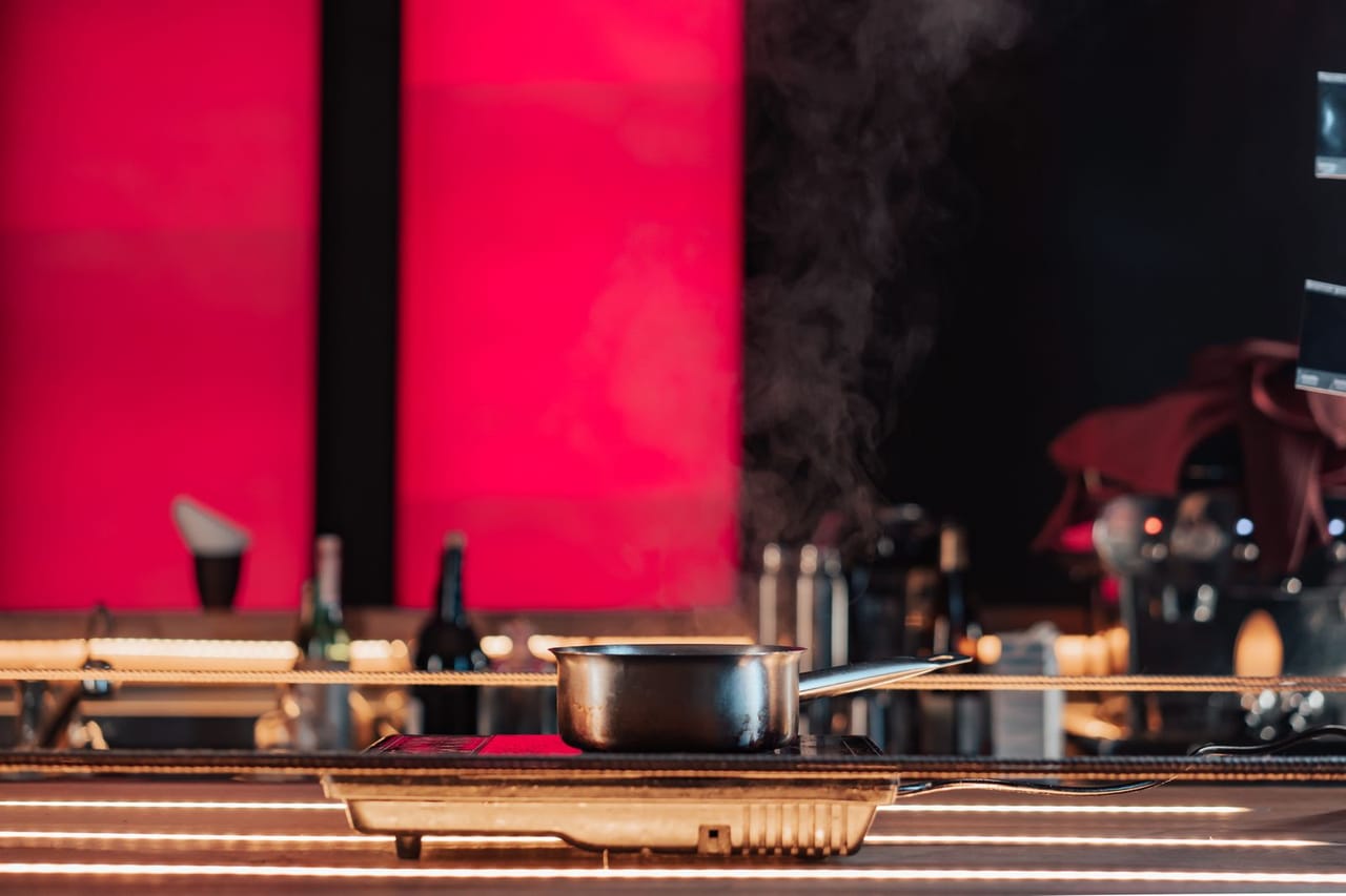 Appliance repair Colorado Springs CO: Steam coming out of a pot standing on an electric stove