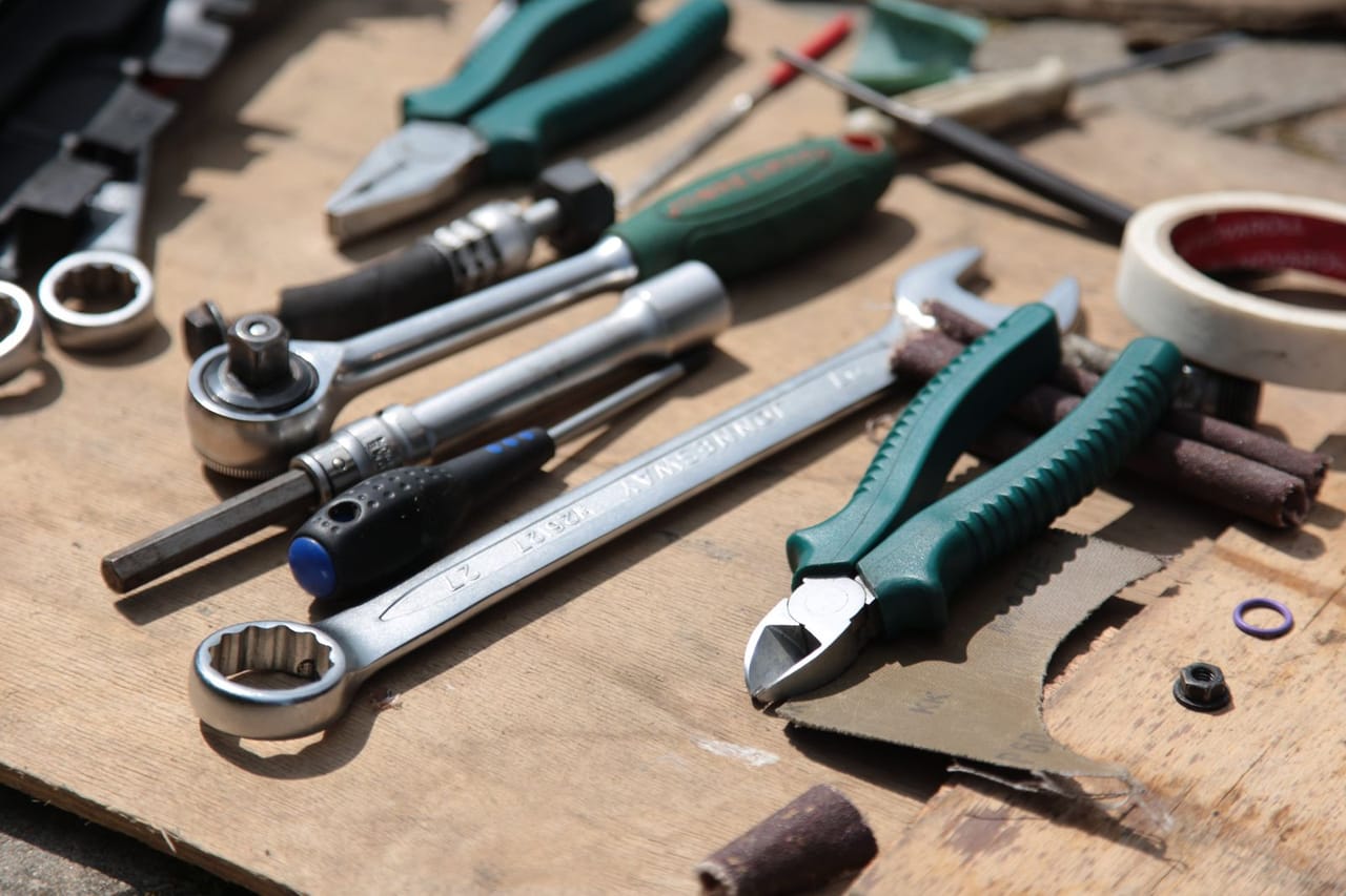Appliance repair Dodge City KS: Assorted hand tools on wooden surface
