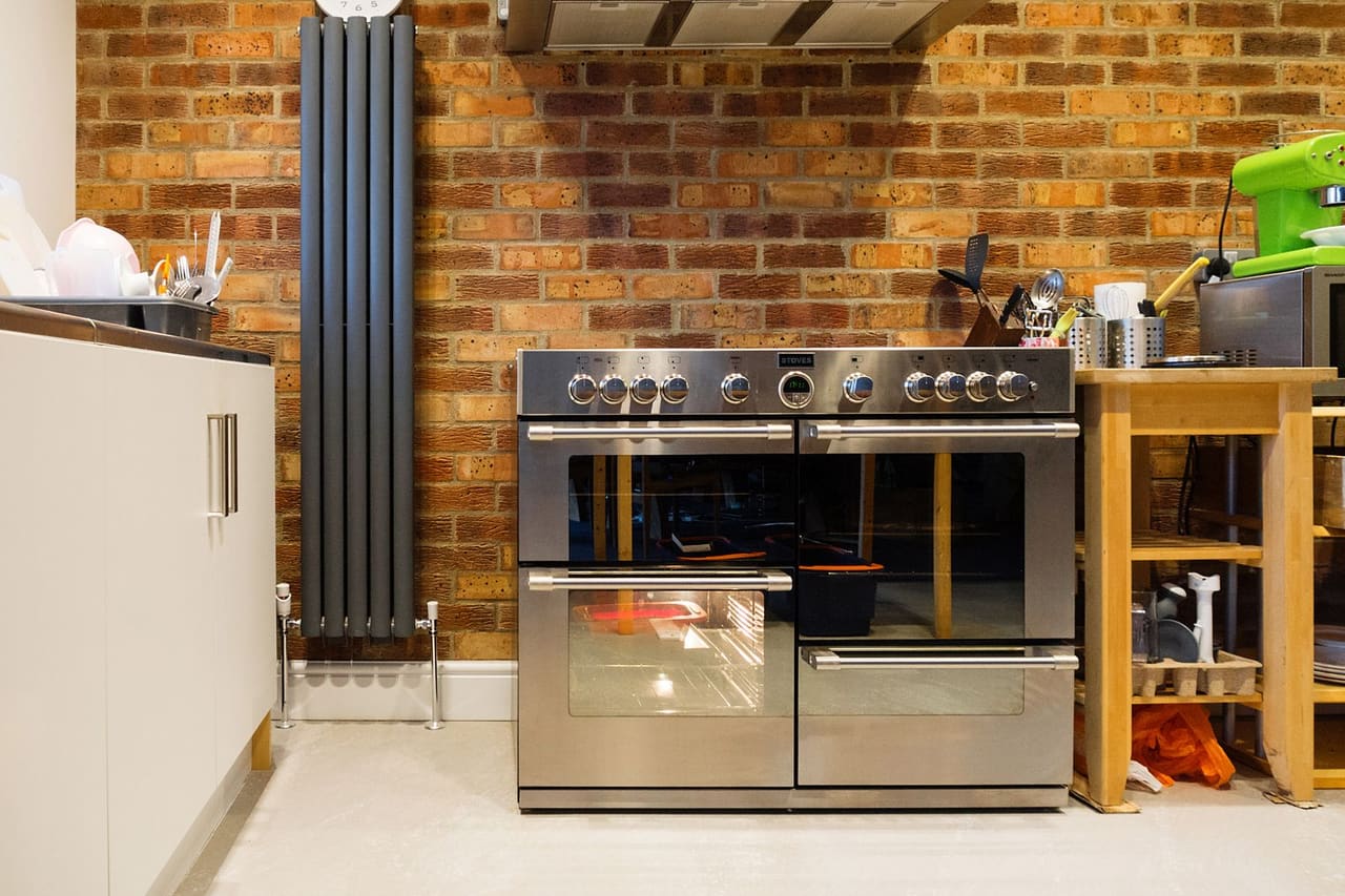 Appliance repair Hialeah FL: Modern kitchen interior with stainless steel oven