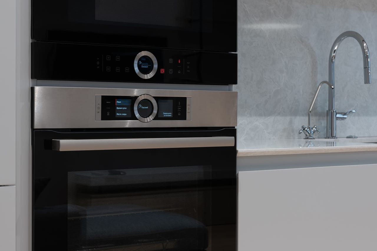 Appliance repair Lakeland FL: Modern convenient embedded stove with microwave oven