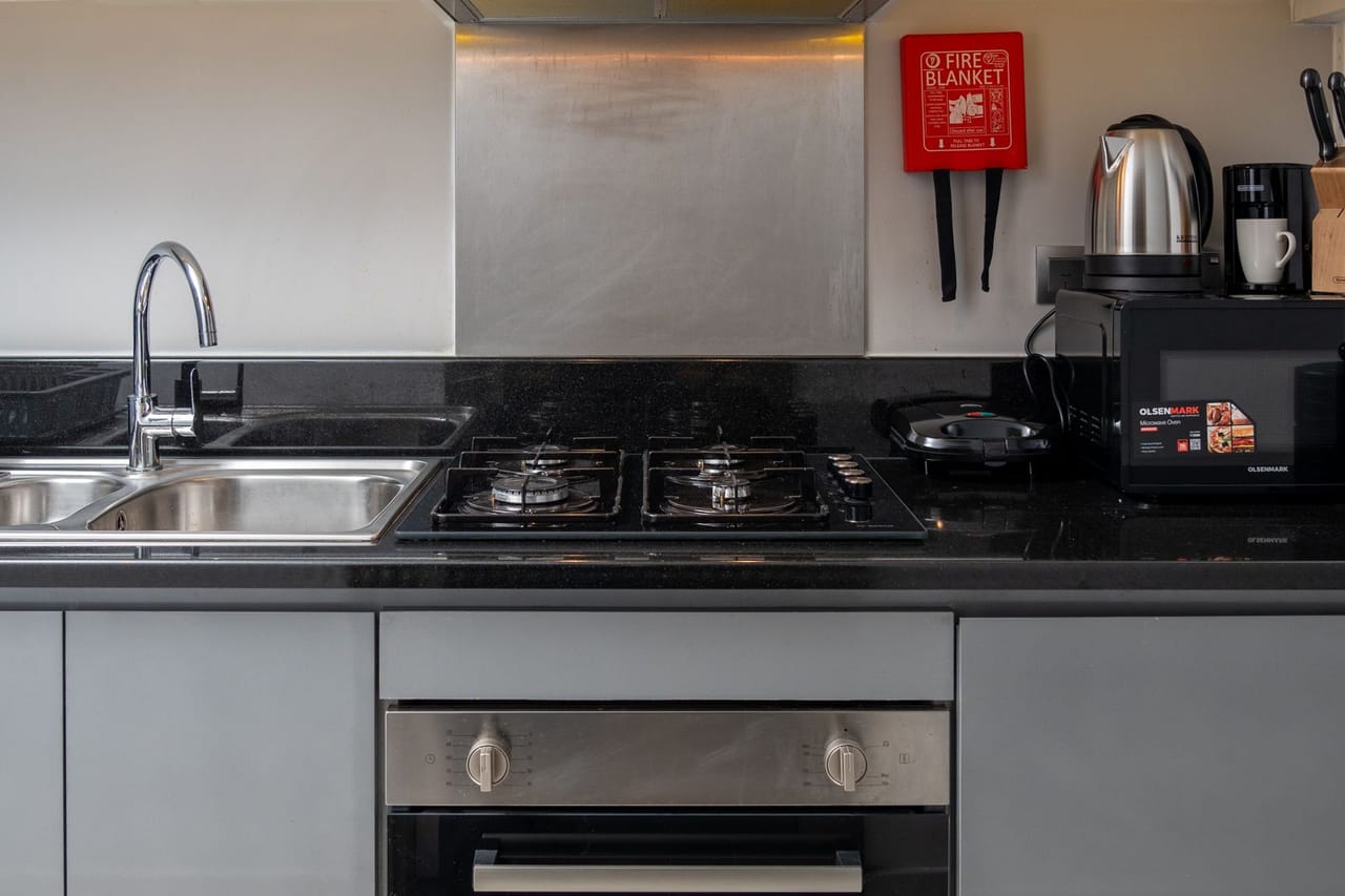 Appliance repair Midland TX: Modern kitchen interior with stainless steel appliances