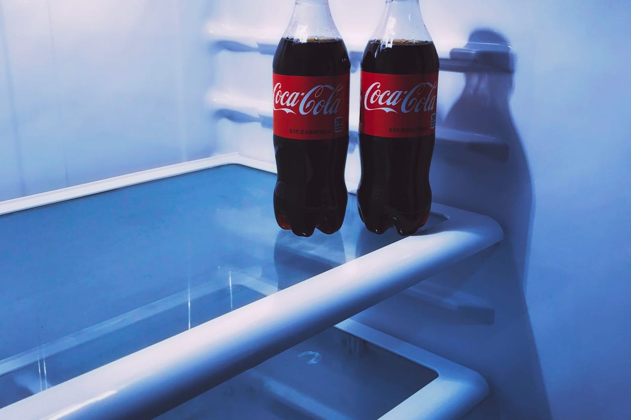 Appliance repair Redding CA: Close up shot of two soft drinks in refrigerator