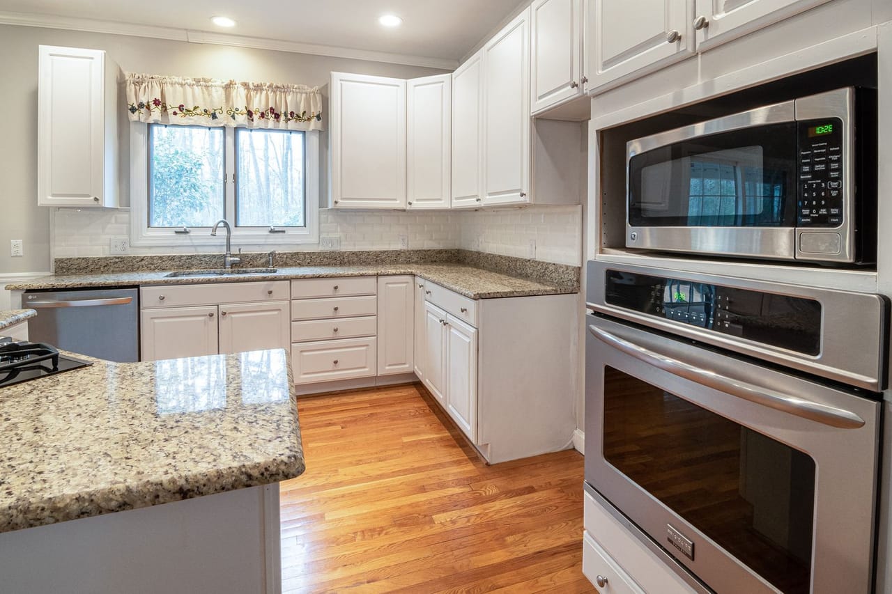 Appliance repair Round Rock TX: Photo of oven near marble surface
