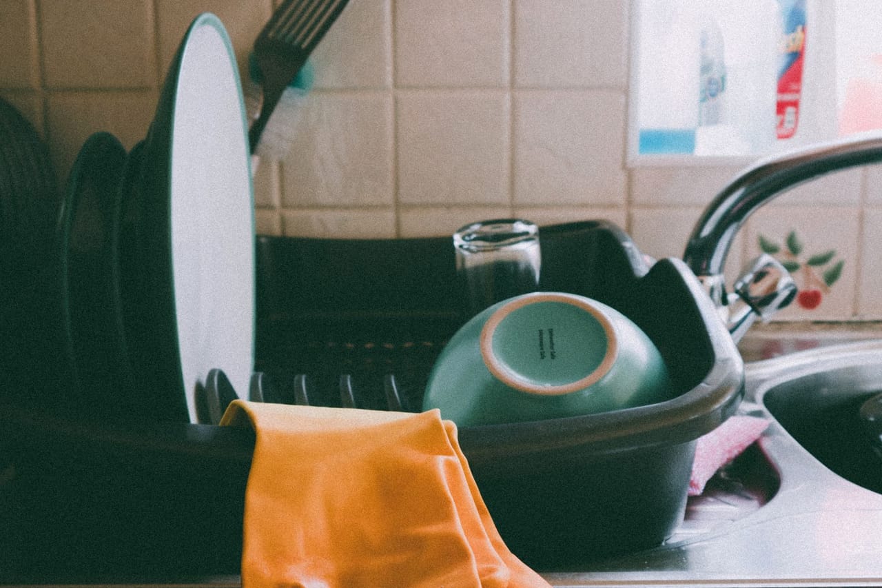 Appliance repair Sandy UT: Yellow latex gloves on dish rack