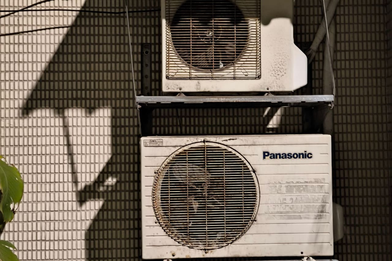 Appliance repair Savannah GA: Air conditioning boxes on the wall of a building