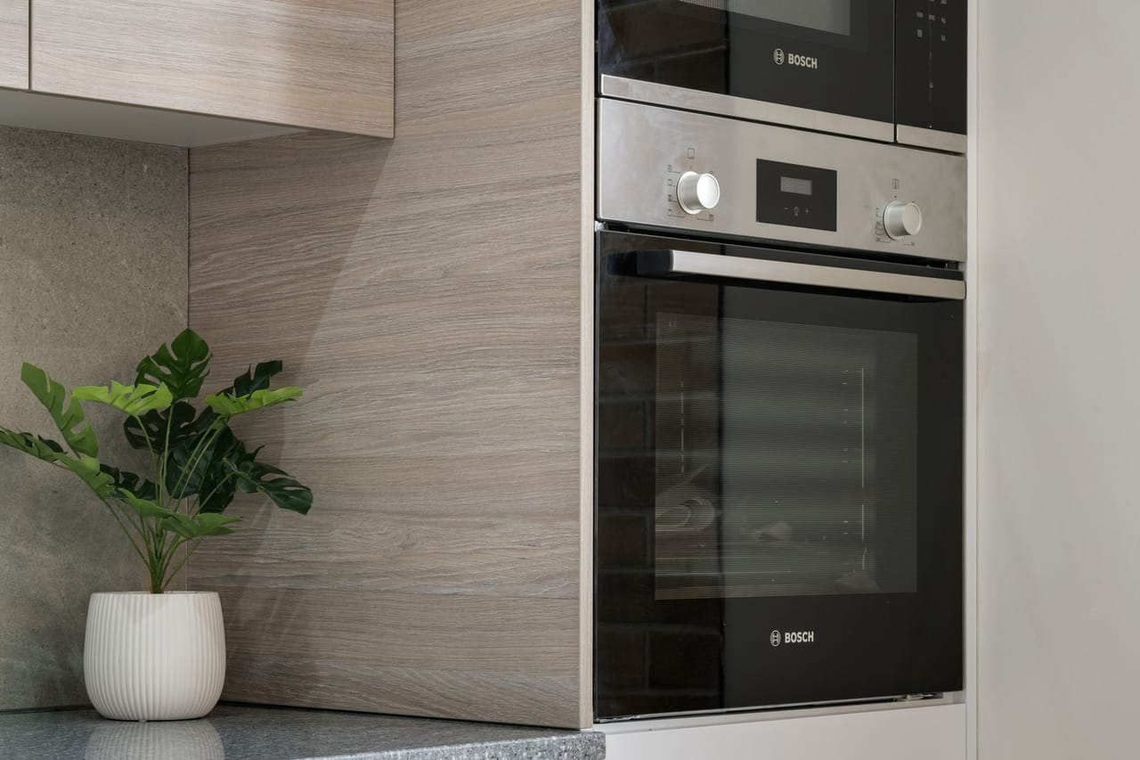 Appliance repair Scranton PA: Plant and microwaves in kitchen