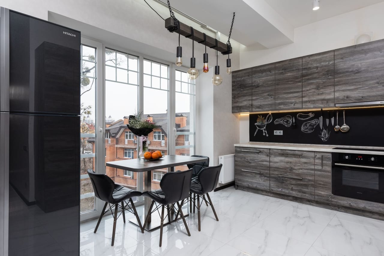 Appliance repair Terre Haute IN: Modern kitchen with table and appliances