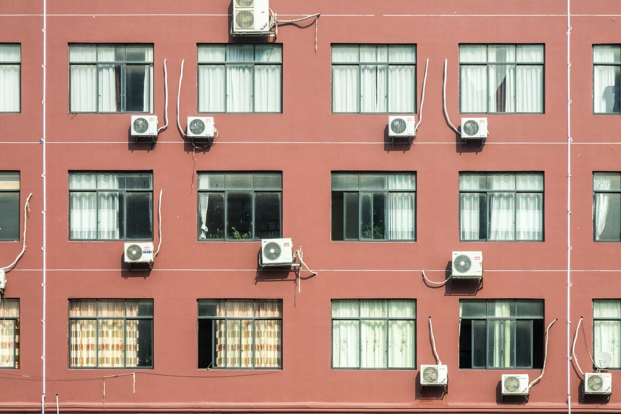 Appliance repair Tyler TX: Wall with windows and air conditioning