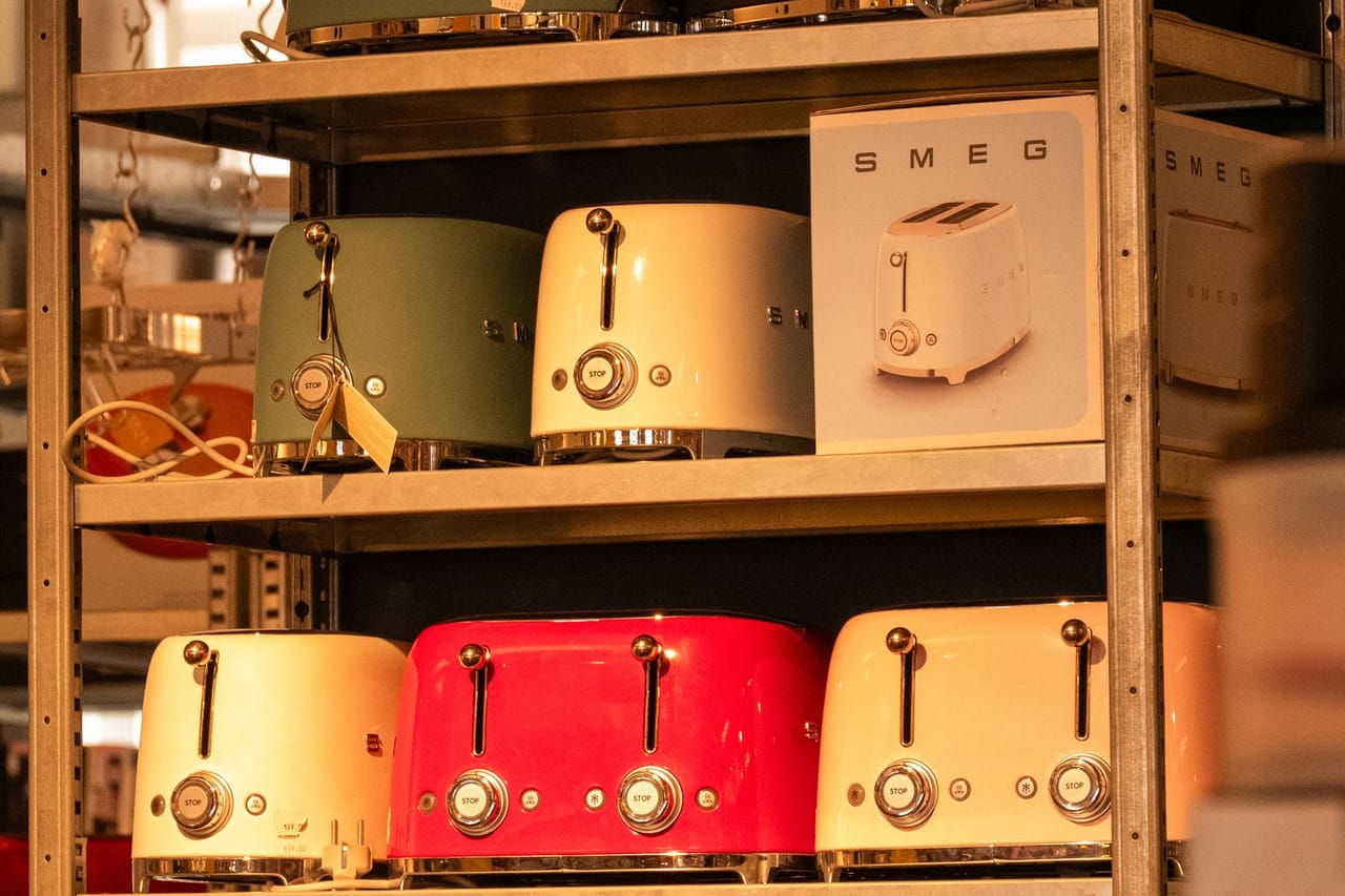 Appliance repair Victoria TX: Colorful smeg toasters on display shelf