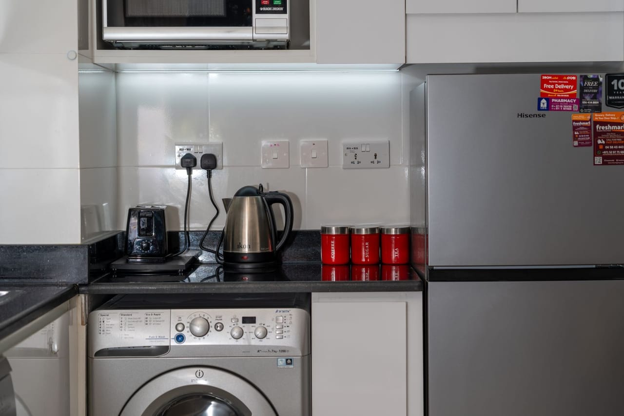 Appliance repair Warren OH: Modern kitchen interior with stainless steel appliances