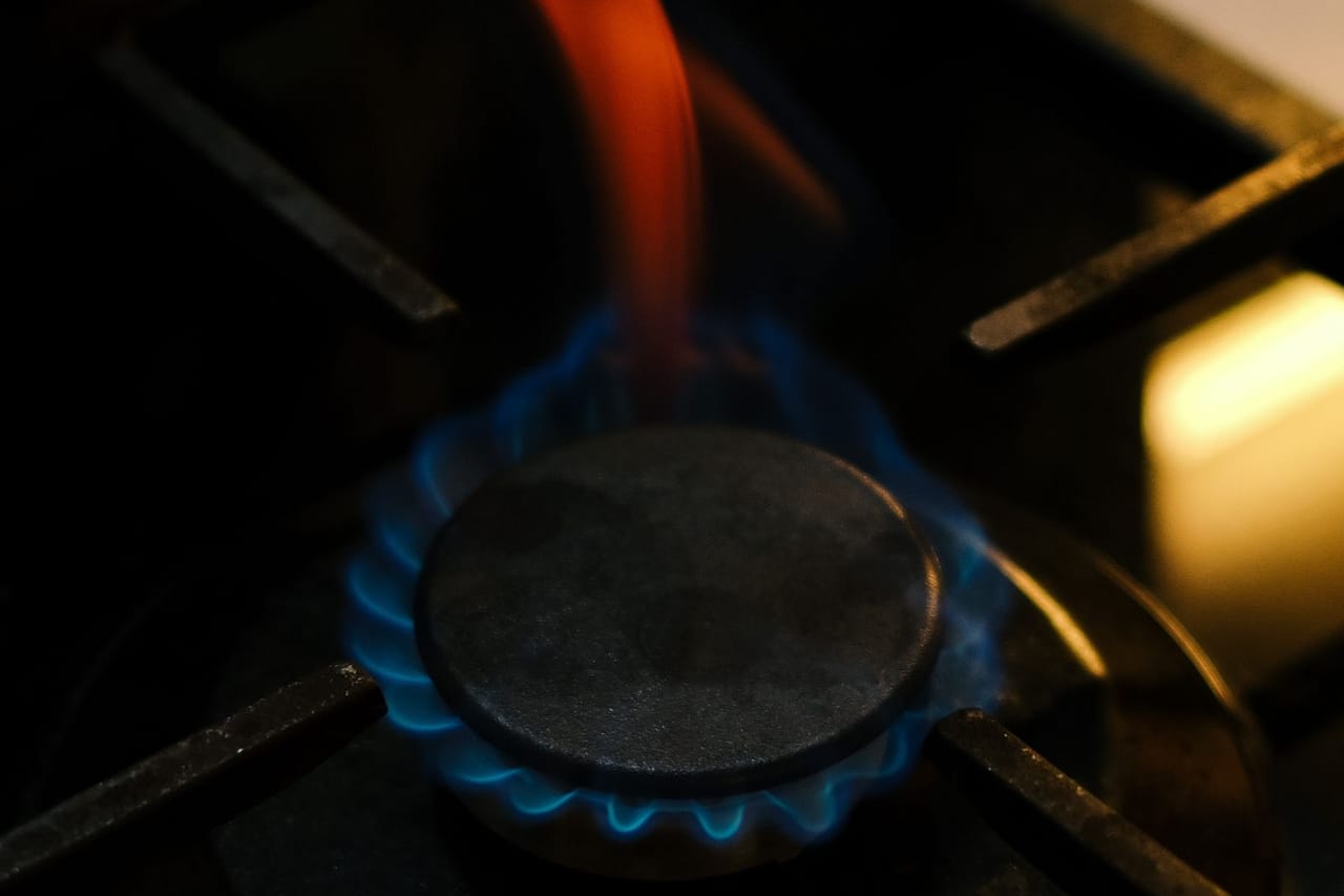 Electric stove burner not working: Close up of a lit gas stove burner