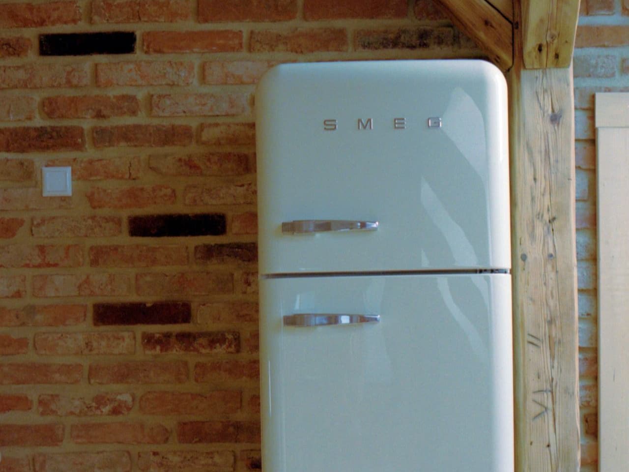 Fridge fan not working: tall white refrigerator in a kitchen corner