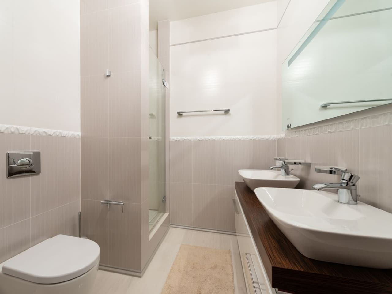 How to remove bathtub drain: bathroom with a shower area and a wall-mounted sink