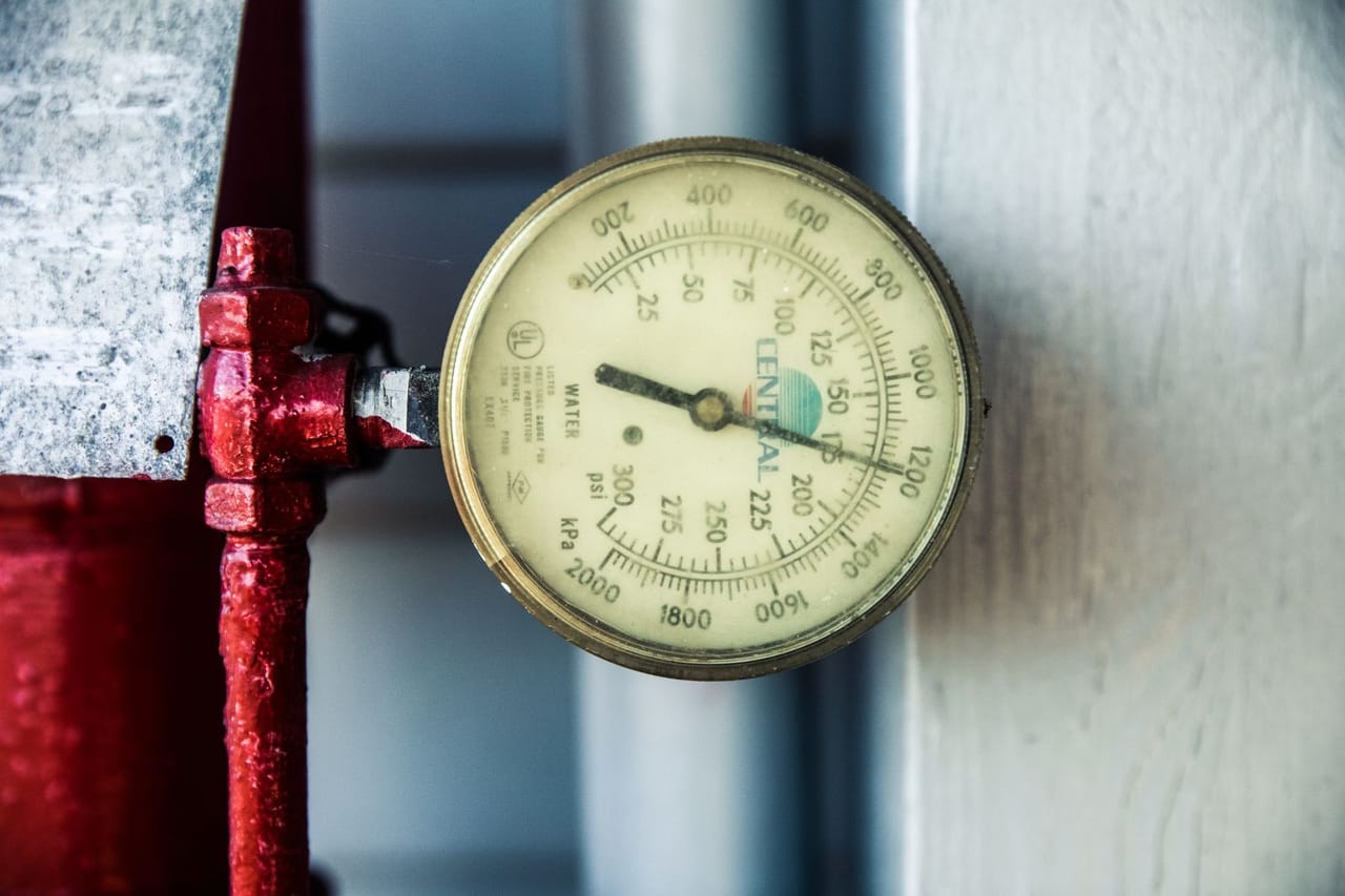 How to reset a water heater: A close up of a water gauge