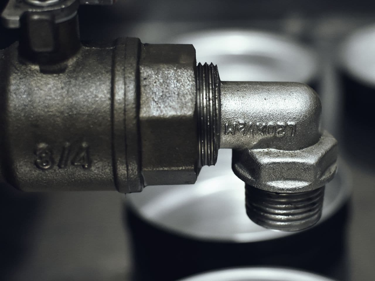 How to turn off water to toilet: chrome shutoff valve with a compression fitting