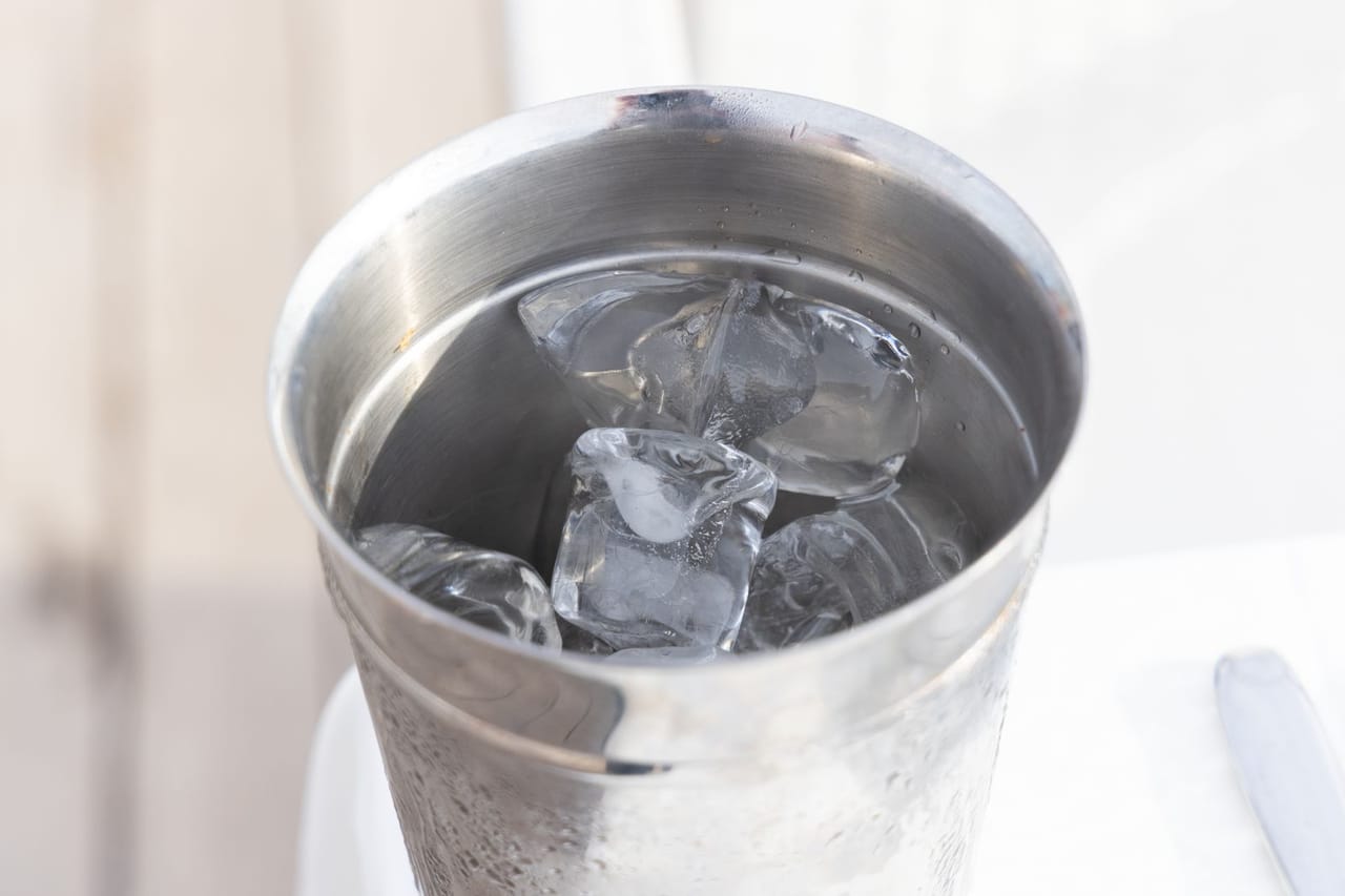 Ice maker not making ice: Stainless steel ice bucket filled with ice