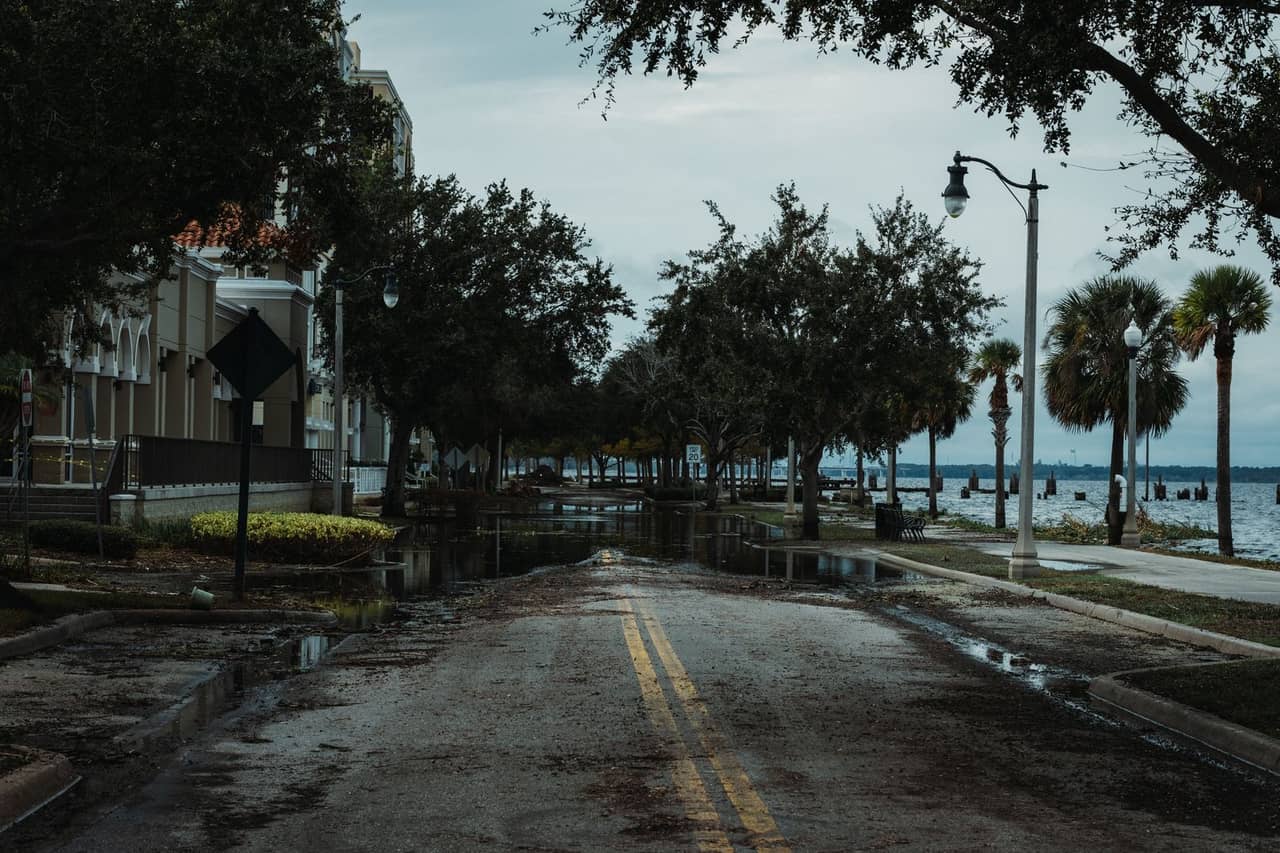 Water damage coverage insurance: Puddle of water on the road