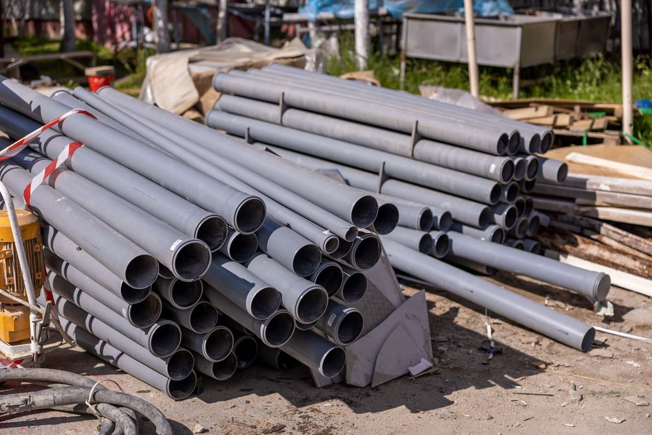 Plumber Beatrice NE: Stack of pvc pipes at a construction site