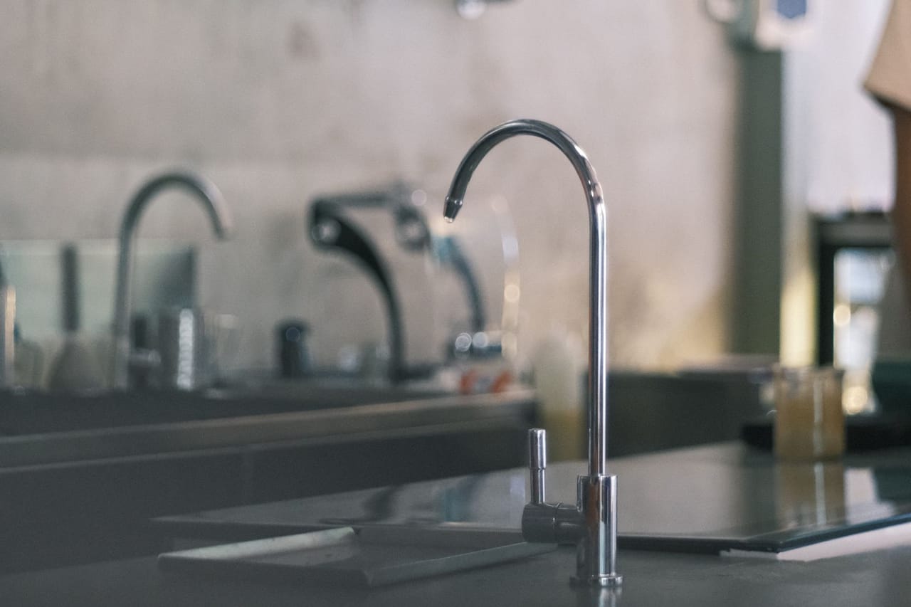 Plumber Midland TX: Modern minimalist kitchen with ch faucet