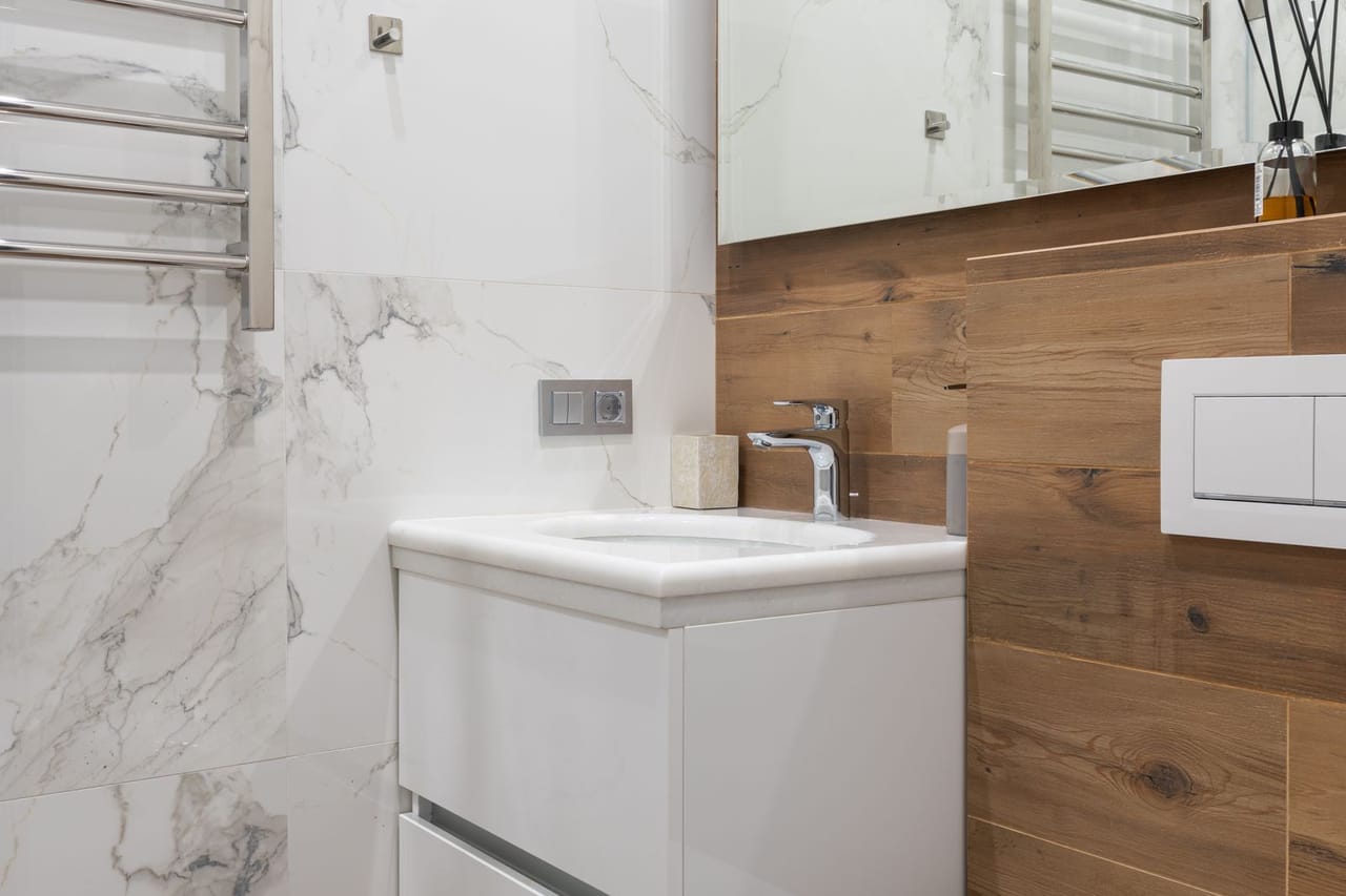 Plumber Morganton NC: Interior of modern light bathroom with toilet