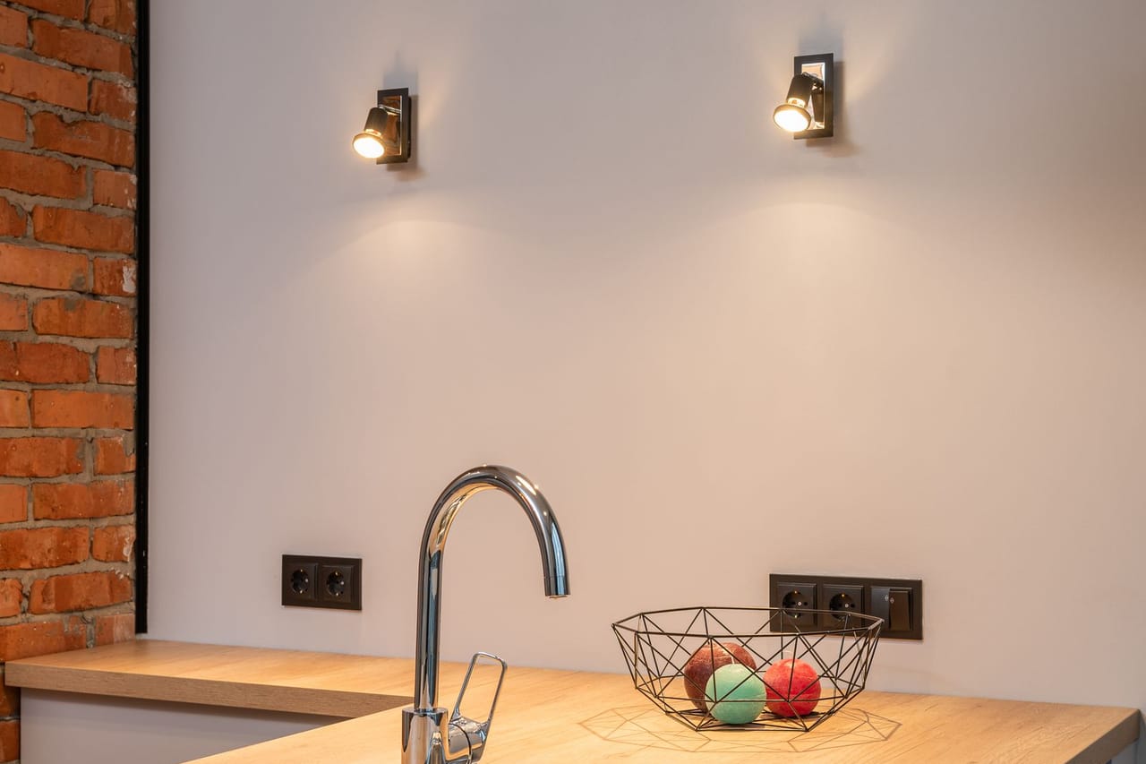 Plumber Pueblo CO: Kitchen counter with sink in small apartment