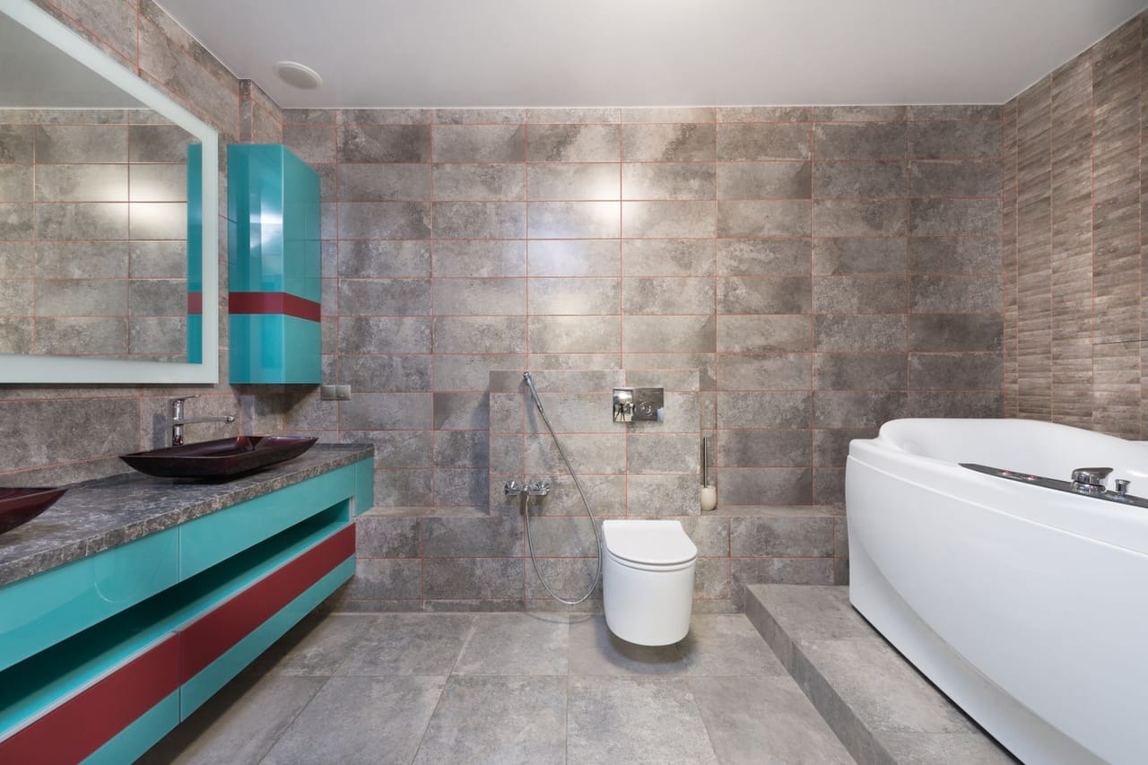 Plumber Ruston LA: Stylish bathroom with tiled floor and walls