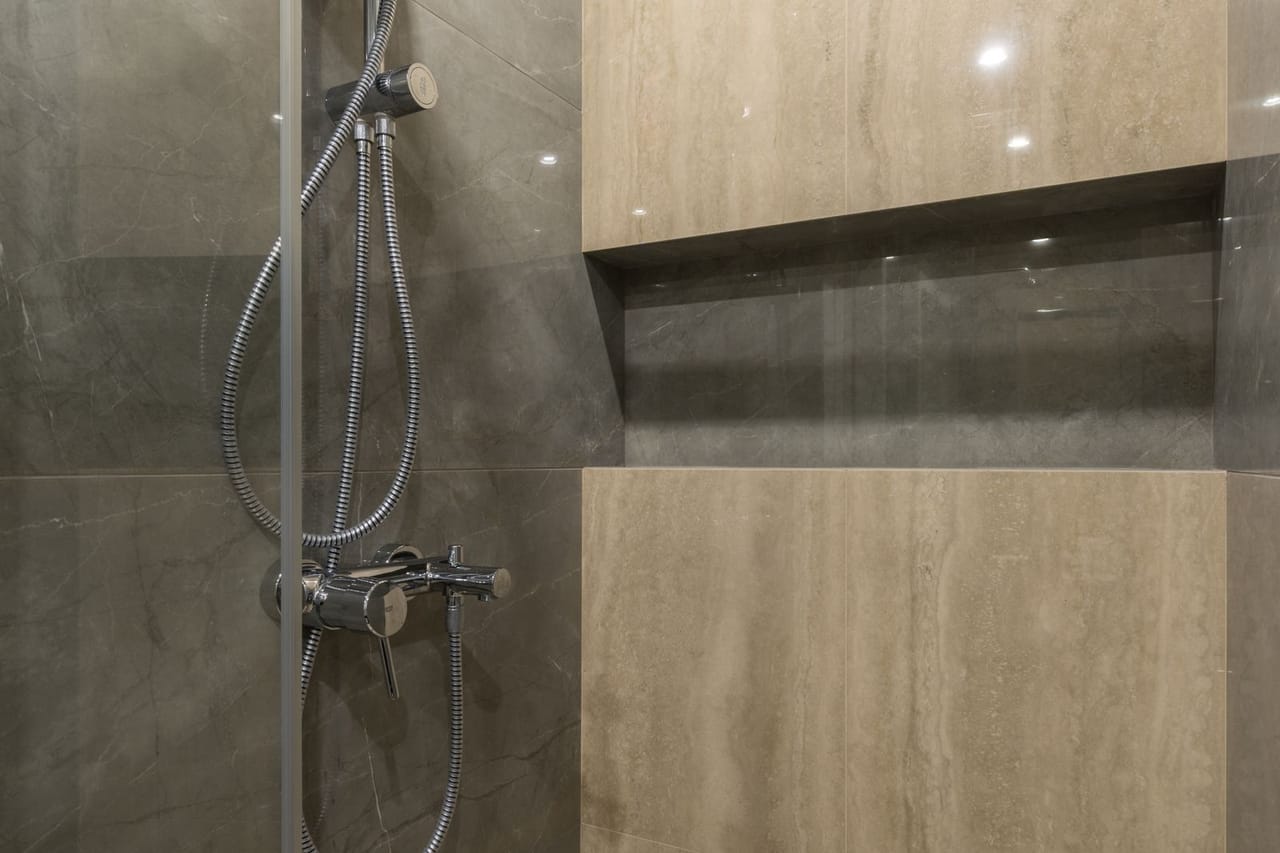 Plumber South Bend IN: Interior of minimalist bathroom with shower cabin
