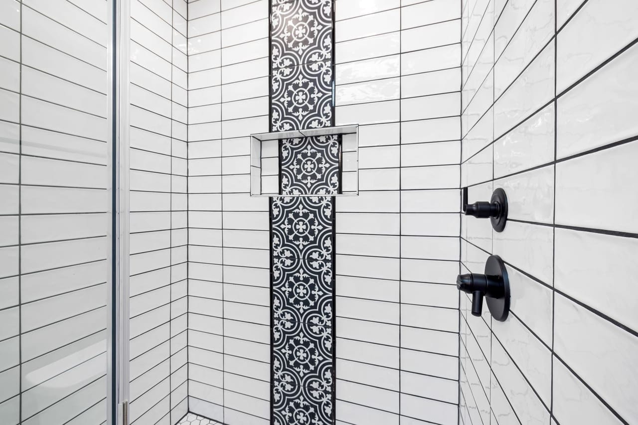 Plumber Tukwila WA: Tiled wall of a bathroom
