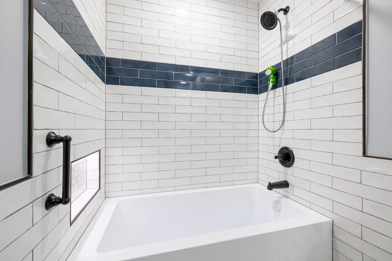 Plumber Twin Falls ID: A white and black themed bathroom with square bathtub