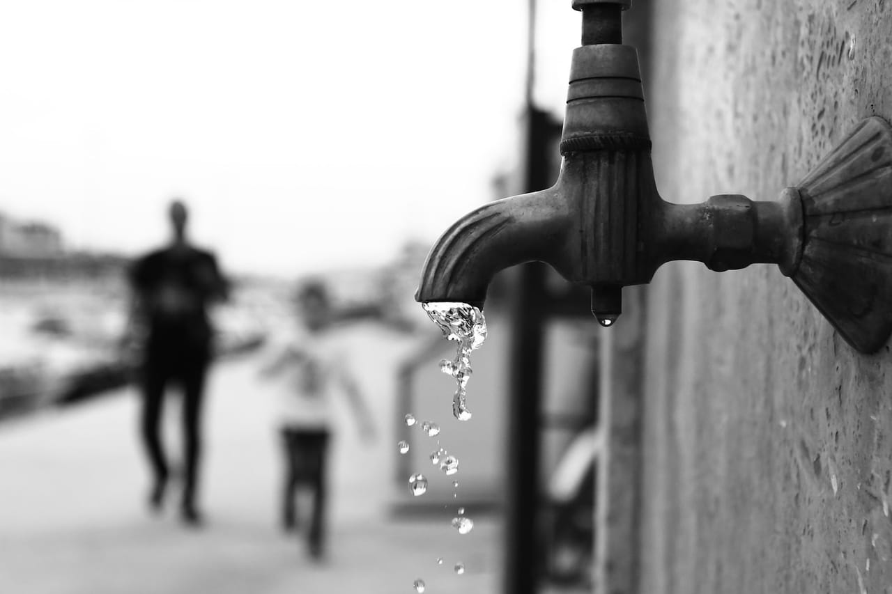 Plumber Vail CO: Grayscale photography of a faucet