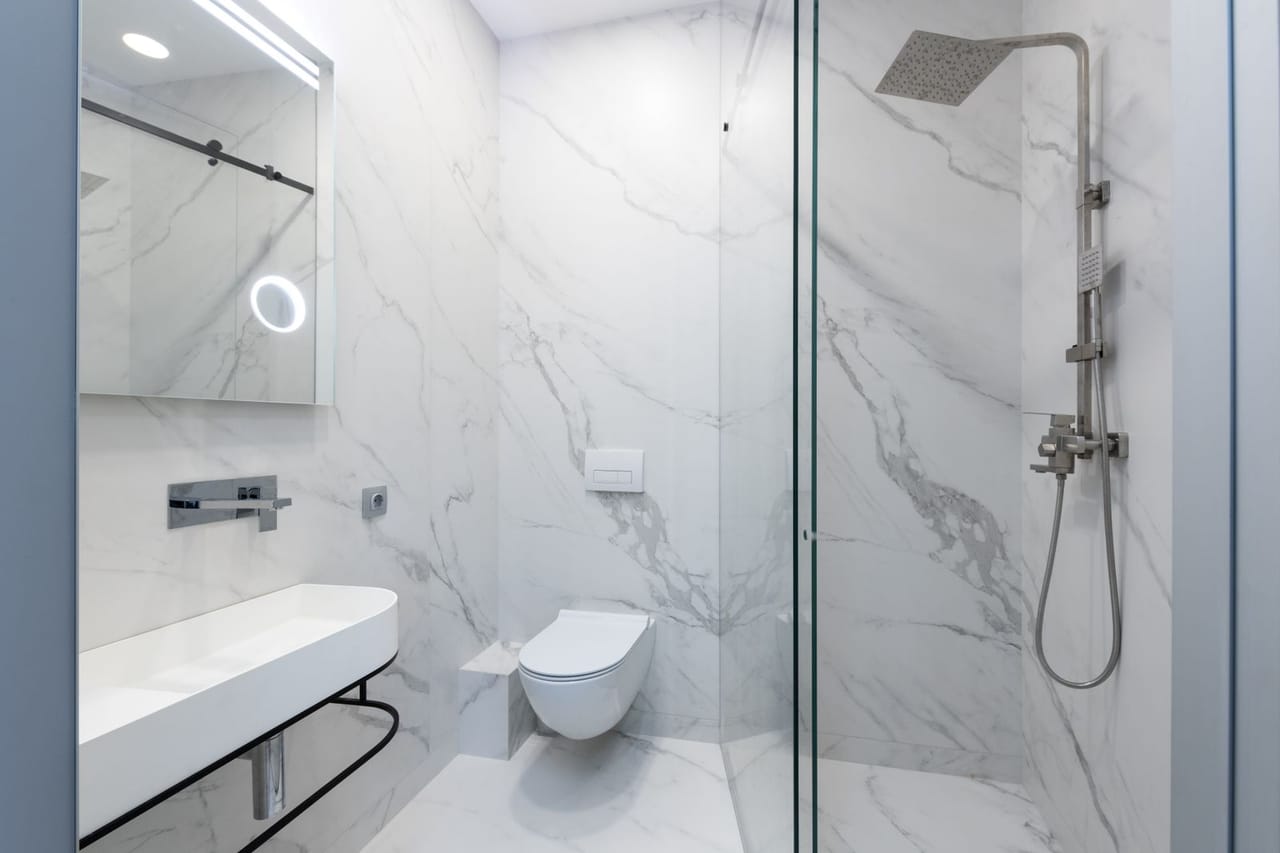Plumber Yakima WA: A toilet with stainless steel shower