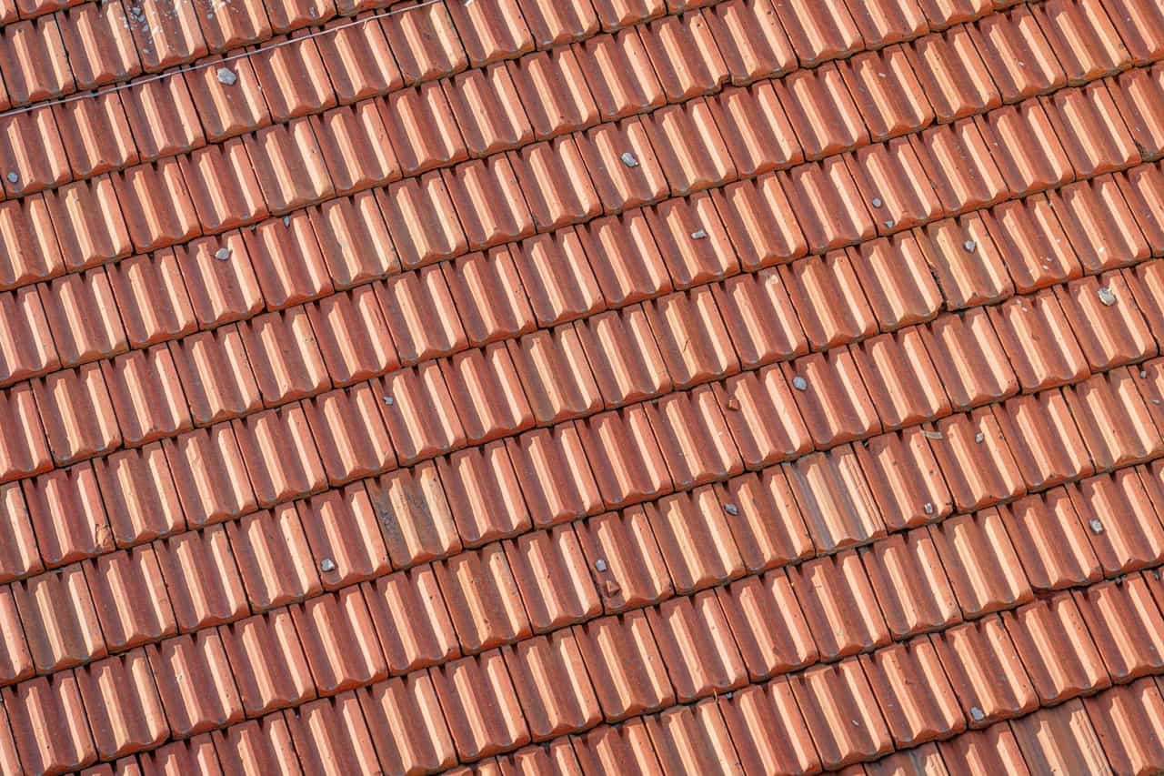 Roof repair Escondido CA: A close up of a roof with many tiles