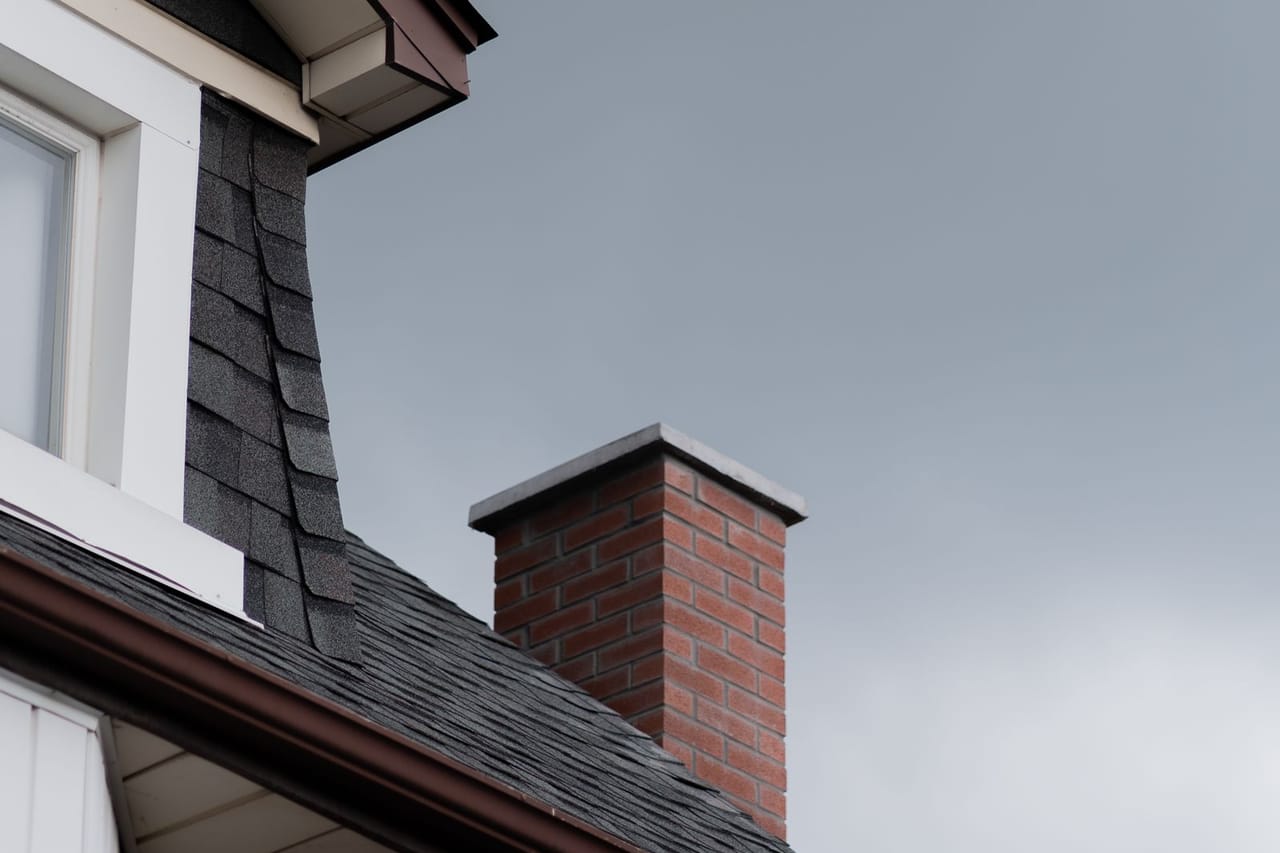 Roof repair Gainesville FL: Chimney on a roof