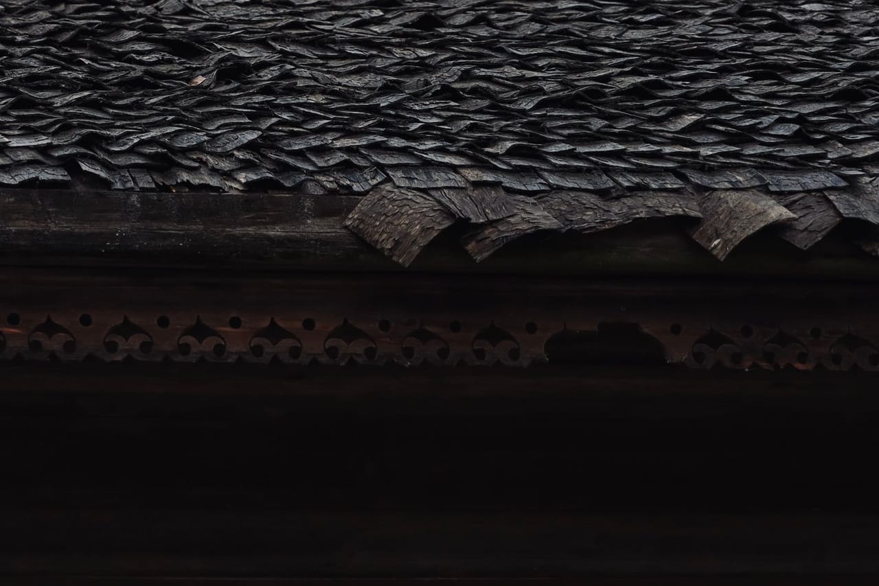 Roof repair Henderson NV: Rustic wooden roof detail with textured shingles