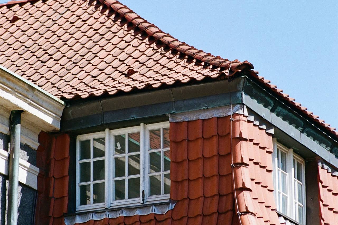 Roof repair Houston TX: Red tile roof architecture