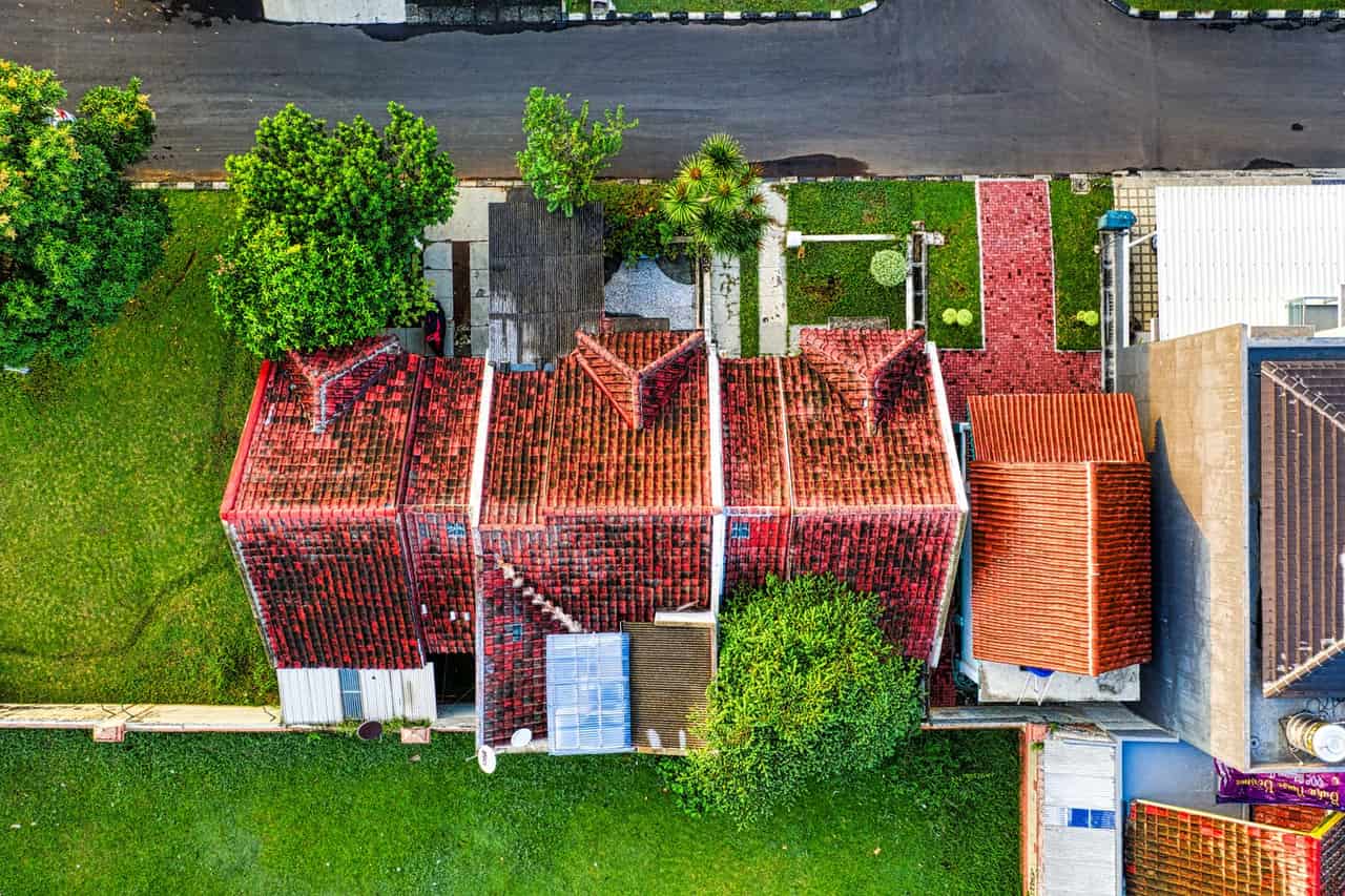 Roof repair Morganton NC: Aerial shot of houses with roofs