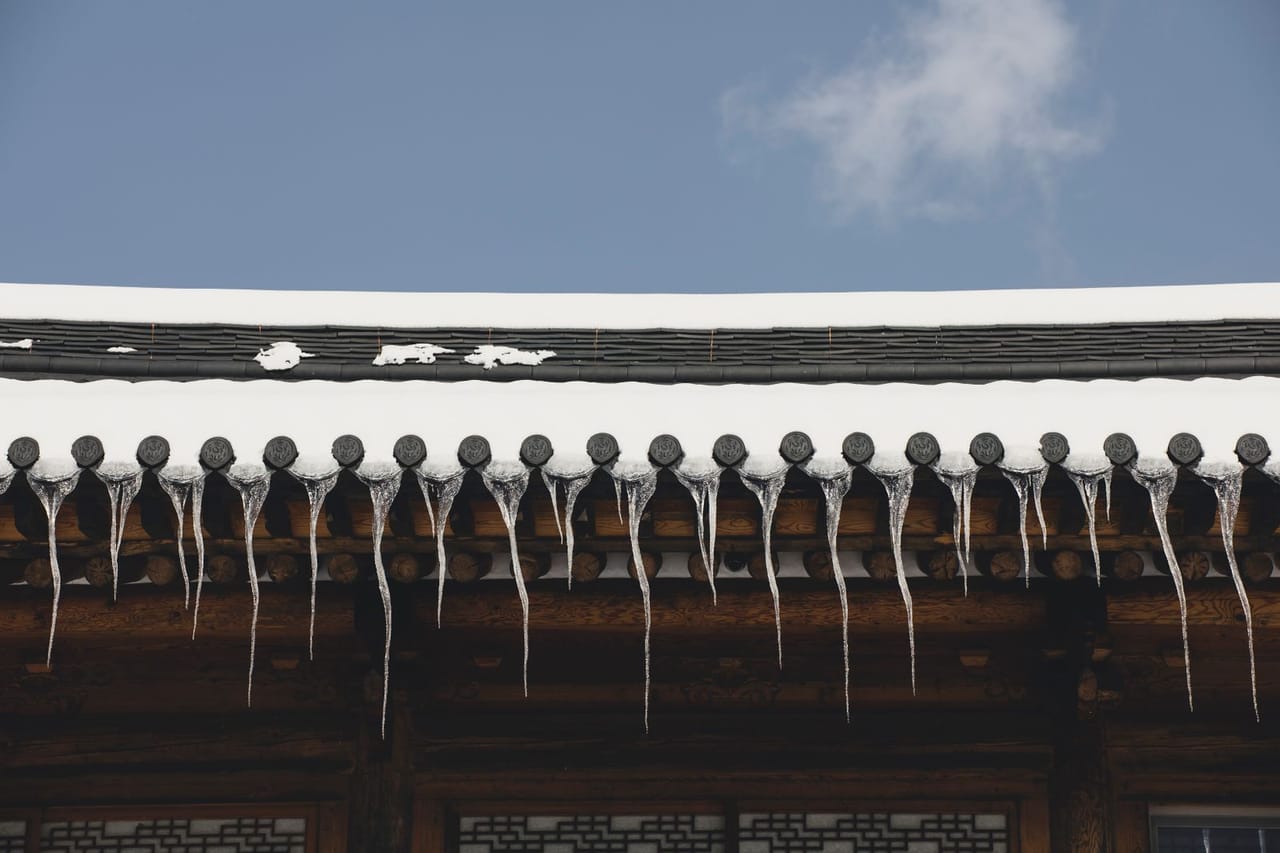 Roof repair Muskegon MI: Frost on a rooftop