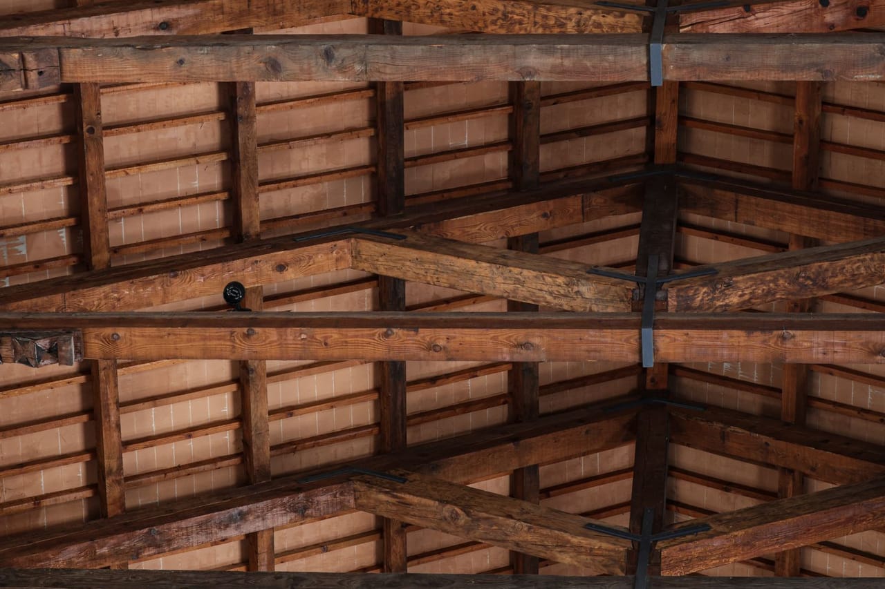 Roof repair Richmond VA: Rustic wooden ceiling with exposed beams