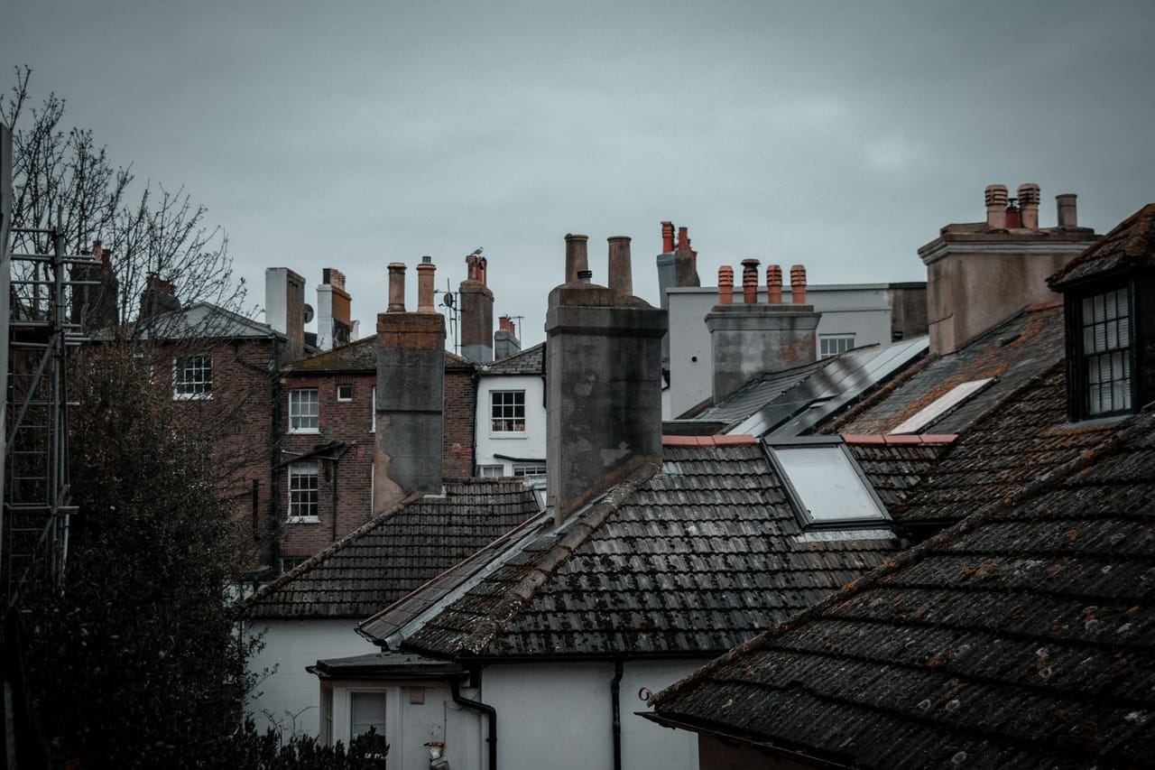 Roof repair Santa Ana CA: Houses with chimneys