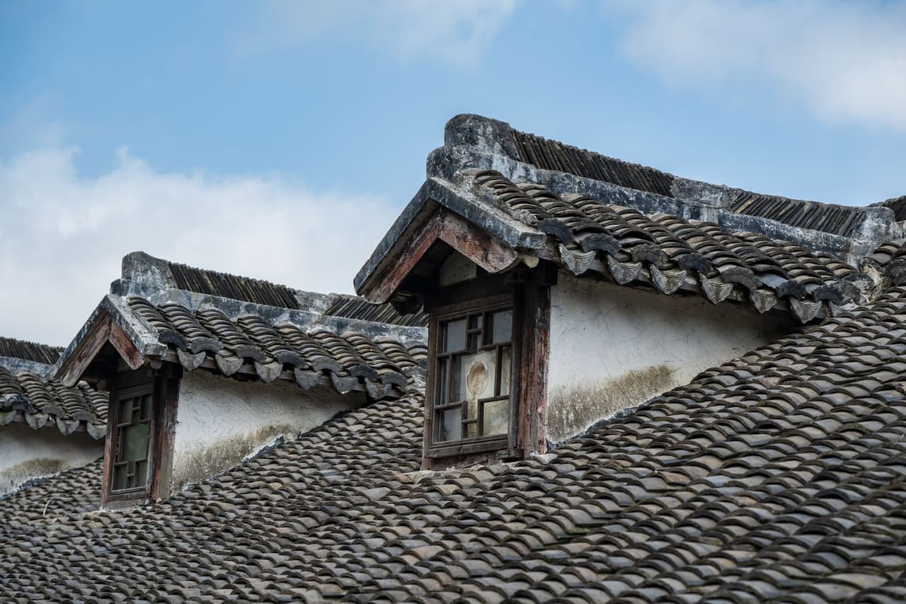 Roof repair Savannah GA: Traditional asian rooftop with dormer window