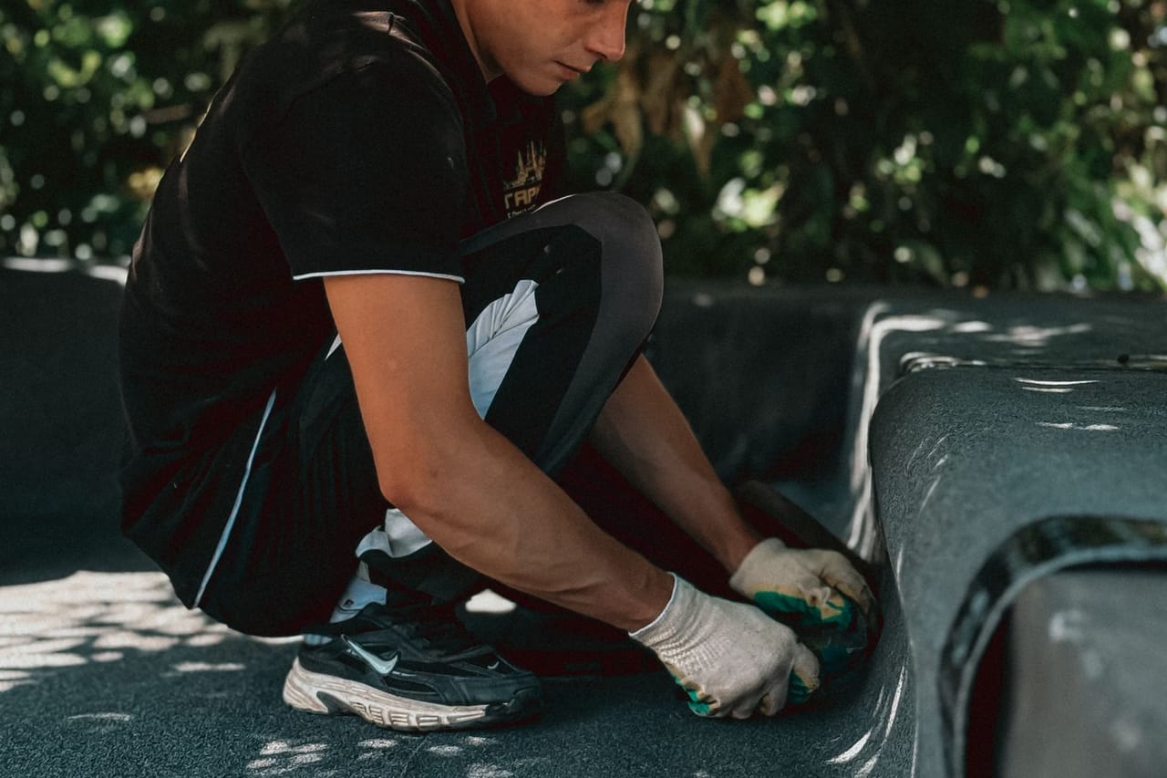 Roof repair Simi Valley CA: Roofing professional installing new material