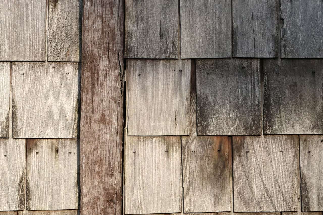 Roof repair Tucson AZ: Rustic wooden shingle wall texture