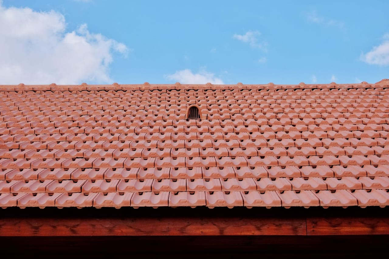 Roof repair Washington DC: Vent on a clay rooftiles