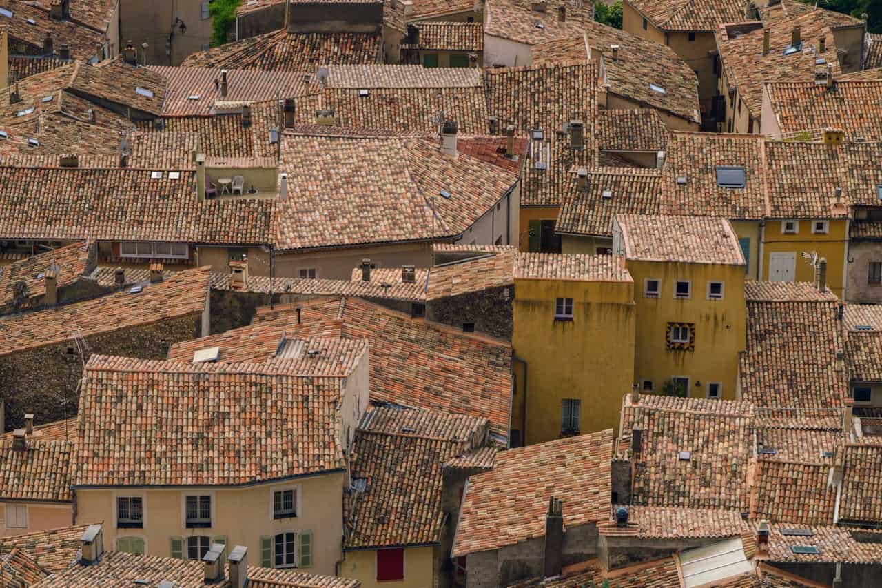 Roof repair York PA: Aerial view of rustic tiled rooftops in europe