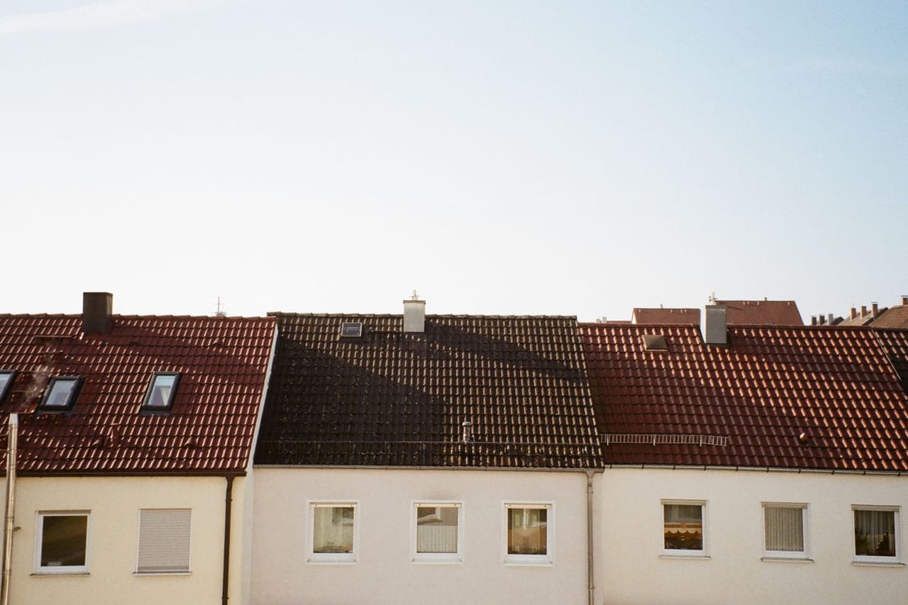 Roof repair Yuma AZ: Sunny day over residential rooftops