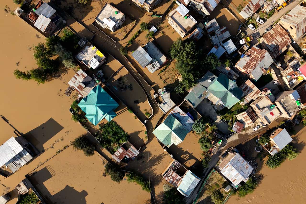 Water damage restoration Fresno CA: Aerial view of flooded residential area