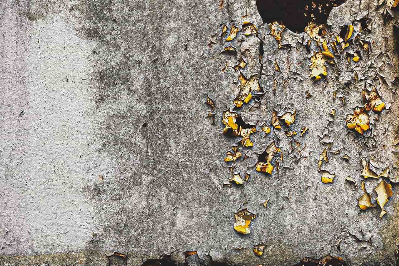 Water damage restoration Naples FL: Close up photo of a teared wall