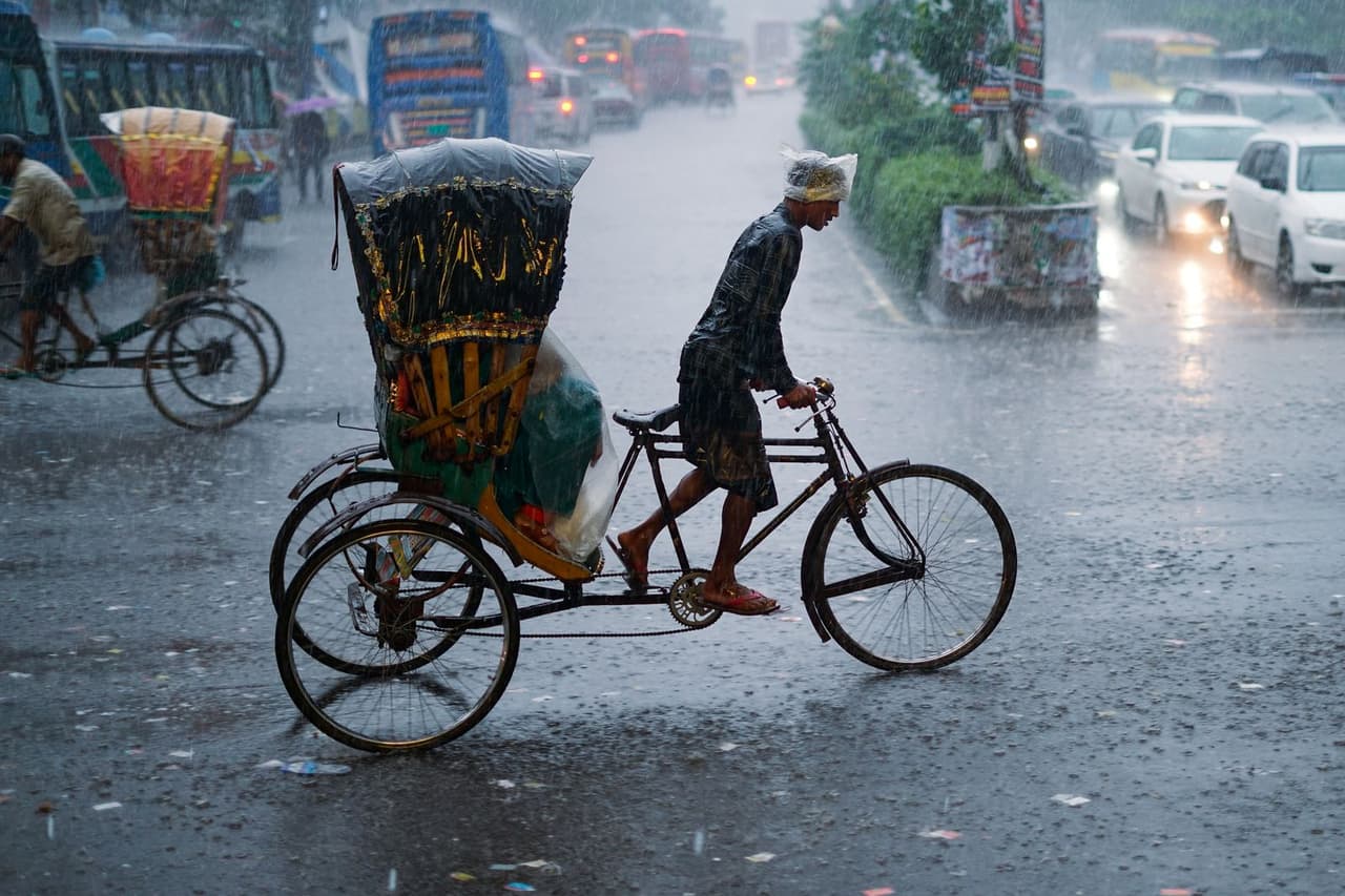 Water damage restoration Ocala FL: Cycle rickshaw on street in rain