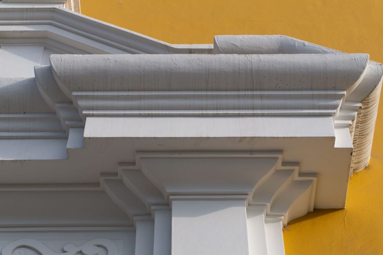 Water damage restoration Santa Clarita CA: Classic colonial moulding on a yellow wall